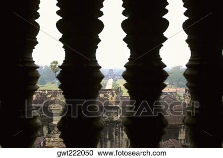 Temple viewed through a balustrade, Ta Prohm Temple, Angkor Wat, Siem Reap, Cambodia View Large Photo Image Stock Image - Temple viewed through a balustrade, Ta Prohm Temple, Angkor Wat, Siem Reap, Cambodia. Fotosearch
