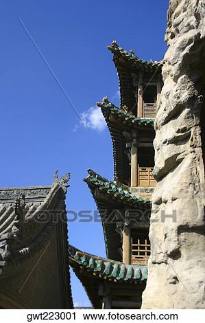 Low angle view of buildings, Yungang Buddhist Caves, China View Large Photo Image Stock Image - Low angle view of buildings, Yungang Buddhist Caves, China. Fotosearch