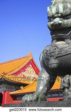 Low angle view of the statue of a lion in front of a palace, Forbidden City, Beijing, China View Large Photo Image Stock Photography - Low angle view of the statue of a lion in front of a palace, Forbidden City, Beijing, China. Fotosearch
