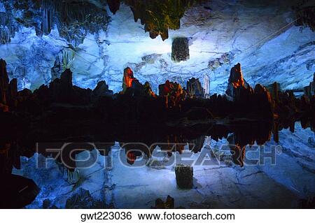 Reflection of rocks in water, Seven Star Cave, Guilin, China View Large Photo Image Stock Photograph - Reflection of rocks in water, Seven Star Cave, Guilin, China. Fotosearch