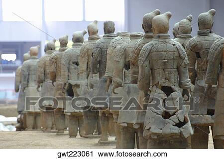 Statues of terracotta soldiers in a row, Xi'an, Shaanxi Province, China View Large Photo Image Stock Image - Statues of terracotta soldiers in a row, Xi'an, Shaanxi Province, China. Fotosearch