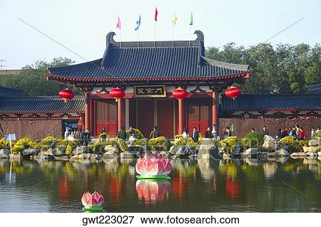 Stock Photo - Tourists in front of a building, Xi'an, Shaanxi province, China. Fotosearch