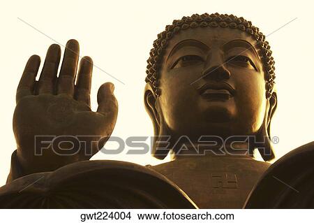 Picture - Low angle view of a statue of Buddha, Tian Tan Buddha, Po Lin Monastery, Ngong Ping, Lantau, Hong Kong, China. Fotosearch