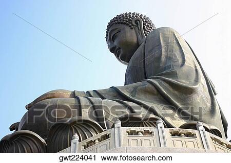 Low angle view of a statue of Buddha, Tian Tan Buddha, Po Lin Monastery, Ngong Ping, Lantau, Hong Kong, China View Large Photo Image Stock Image - Low angle view of a statue of Buddha, Tian Tan Buddha, Po Lin Monastery, Ngong Ping, Lantau, Hong Kong, China. Fotosearch