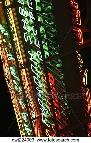 Low angle view of neon signs illuminated on the building at the night, Kowloon, Hong Kong, China View Large Photo Image Stock Image - Low angle view of neon signs illuminated on the building at the night, Kowloon, Hong Kong, China. Fotosearch