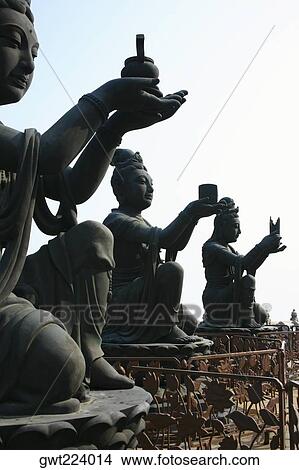 Statues in a monastery, Tian Tan Buddha, Po Lin Monastery, Ngong Ping, Lantau, Hong Kong, China View Large Photo Image Picture - Statues in a monastery, Tian Tan Buddha, Po Lin Monastery, Ngong Ping, Lantau, Hong Kong, China. Fotosearch