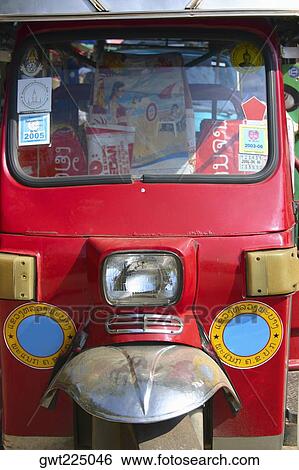 Stock Photograph - Close-up of a jinrikisha, Luang Prabang, Laos. Fotosearch