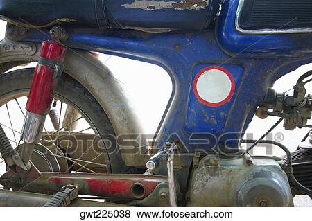 Stock Photo - Close-up of a motorcycle, Luang Prabang, Laos. Fotosearch