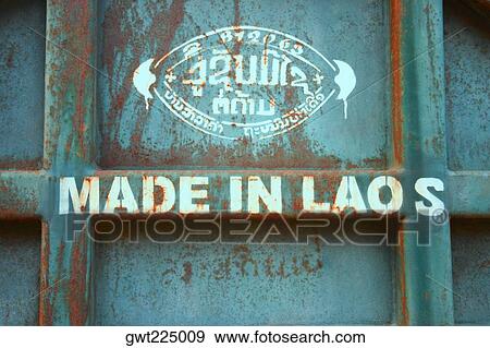 Close-up of a text on a metal surface, Vientiane, Laos View Large Photo Image Stock Photo - Close-up of a text on a metal surface, Vientiane, Laos. Fotosearch