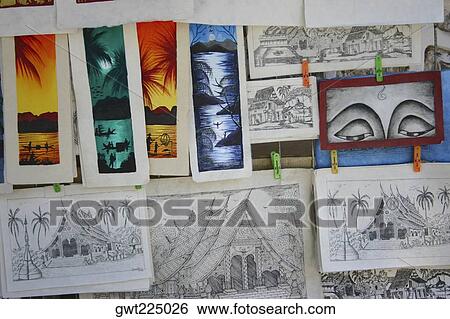 Close-up of paintings, Night Market, Luang Prabang, Laos View Large Photo Image Stock Photograph - Close-up of paintings, Night Market, Luang Prabang, Laos. Fotosearch