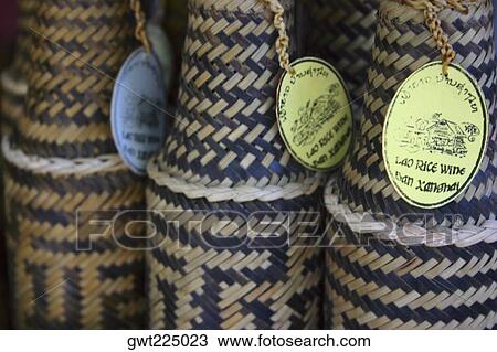 Close-up of rice wine wickers, Night Market, Luang Prabang, Laos View Large Photo Image Stock Image - Close-up of rice wine wickers, Night Market, Luang Prabang, Laos. Fotosearch