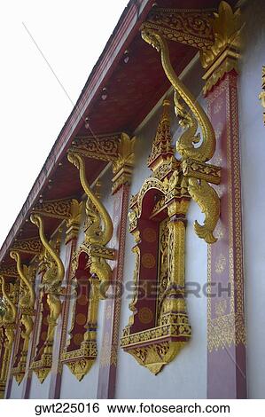 Low angle view of ornate windows, Vientiane, Laos View Large Photo Image Stock Photograph - Low angle view of ornate windows, Vientiane, Laos. Fotosearch