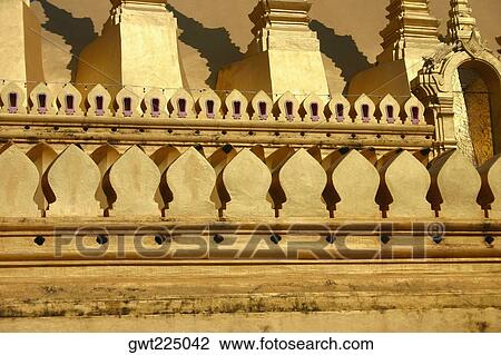 Stock Image - Wall of a Buddhist temple, That Luang, Vientiane, Laos. Fotosearch
