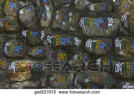 Close-up of a script painted on a stone wall, Swayambhunath, Kathmandu, Nepal View Large Photo Image Stock Image - Close-up of a script painted on a stone wall, Swayambhunath, Kathmandu, Nepal. Fotosearch