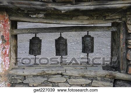 Stock Photo - Close-up of prayer wheels, Muktinath, Annapurna Range, Himalayas, Nepal. Fotosearch