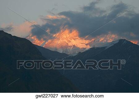 Clouds over mountains, Muktinath, Annapurna Range, Himalayas, Nepal View Large Photo Image Stock Photo - Clouds over mountains, Muktinath, Annapurna Range, Himalayas, Nepal. Fotosearch