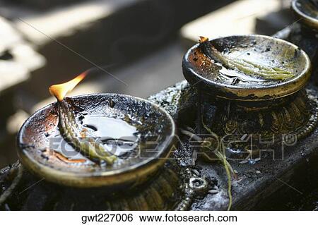 High angle view of oil lamps, Swayambhunath, Kathmandu, Nepal View Large Photo Image Stock Photograph - High angle view of oil lamps, Swayambhunath, Kathmandu, Nepal. Fotosearch