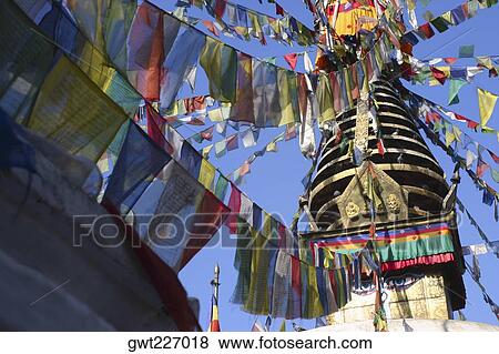 Low angle view of a temple, Swayambhunath, Kathmandu, Nepal View Large Photo Image Stock Photo - Low angle view of a temple, Swayambhunath, Kathmandu, Nepal. Fotosearch