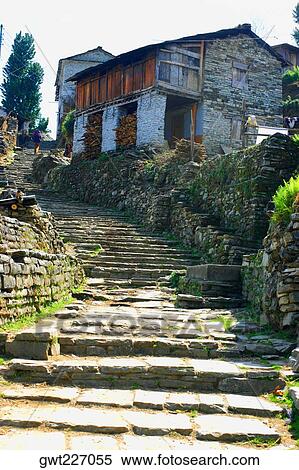 Stock Photography - Low angle view of houses in a town, Tadapani, Annapurna Range, Himalayas, Nepal. Fotosearch