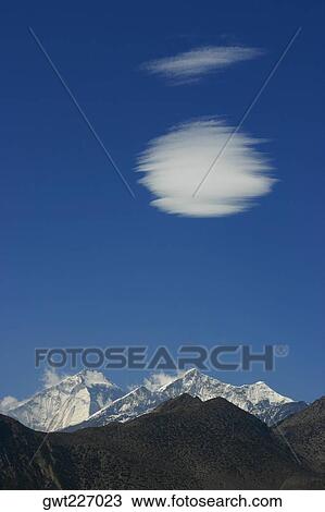 Panoramic view of snow covered mountains, Muktinath, Annapurna Range, Himalayas, Nepal View Large Photo Image Stock Image - Panoramic view of snow covered mountains, Muktinath, Annapurna Range, Himalayas, Nepal. Fotosearch