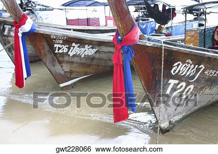 Boats moored on the beach, Phi Phi Islands, Thailand View Large Photo Image Stock Photograph - Boats moored on the beach, Phi Phi Islands, Thailand. Fotosearch