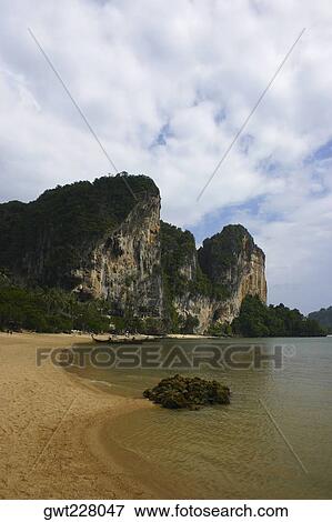 Cliffs overlooking the sea, Phi Phi Islands, Thailand View Large Photo Image Stock Photo - Cliffs overlooking the sea, Phi Phi Islands, Thailand. Fotosearch