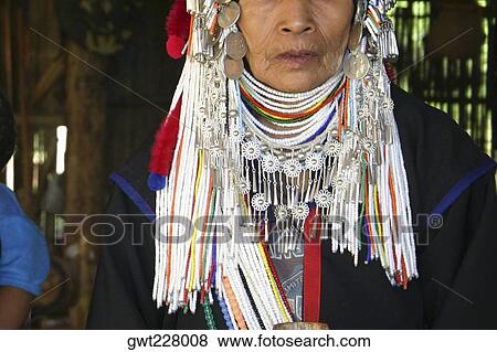Close-up of a senior woman in traditional clothing, Chiang Khong, Thailand View Large Photo Image Stock Photo - Close-up of a senior woman in traditional clothing, Chiang Khong, Thailand. Fotosearch