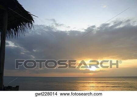 Sunset over the sea, Phi Phi Islands, Thailand View Large Photo Image Picture - Sunset over the sea, Phi Phi Islands, Thailand. Fotosearch