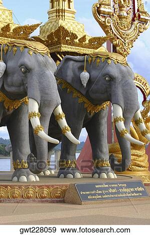 Two statues of elephants, Chiang Khong, Thailand View Large Photo Image Stock Photo - Two statues of elephants, Chiang Khong, Thailand. Fotosearch