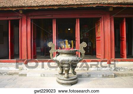 Stock Image - Decorative urn in front of a temple, Hanoi, Vietnam. Fotosearch