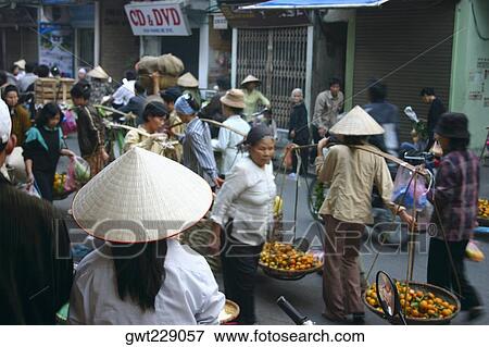 Group of people in a market, Hanoi, Vietnam View Large Photo Image Stock Photo - Group of people in a market, Hanoi, Vietnam. Fotosearch