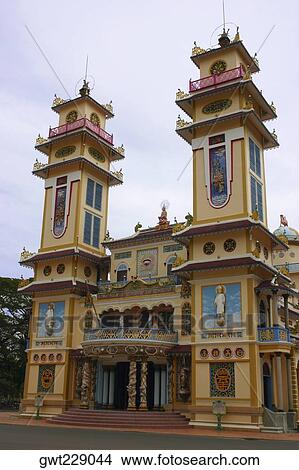 Low angle view of a monastery, Cao Dai Monastery, Tay Ninh, Vietnam View Large Photo Image Picture - Low angle view of a monastery, Cao Dai Monastery, Tay Ninh, Vietnam. Fotosearch