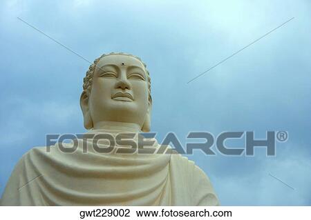 Low angle view of a statue of Buddha, Long Song Temple, Nha Trang, Vietnam View Large Photo Image Stock Image - Low angle view of a statue of Buddha, Long Song Temple, Nha Trang, Vietnam. Fotosearch