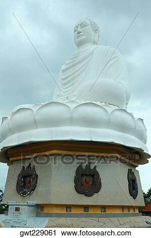 Stock Image - Low angle view of a statue of Buddha, Long Song Temple, Nha Trang, Vietnam. Fotosearch