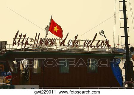Vietnamese flag on a boat, Halong Bay, Vietnam View Large Photo Image Stock Image - Vietnamese flag on a boat, Halong Bay, Vietnam. Fotosearch