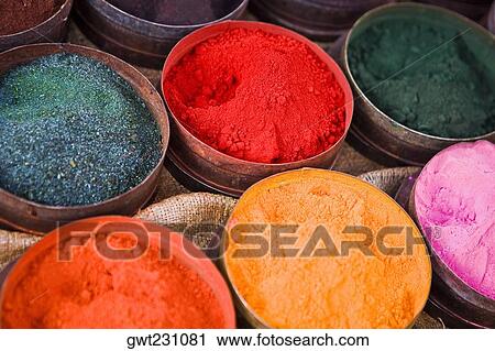 Stock Image - Close-up of various powder paints at a market stall, Pisaq, Cuzco, Peru. Fotosearch