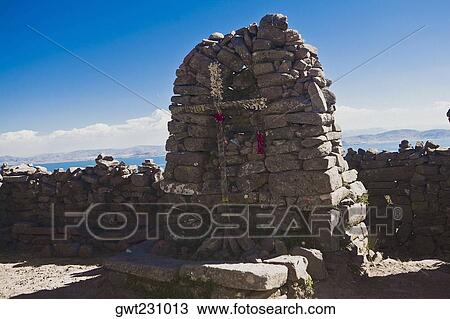 Cross on a stone wall, Lake Titicaca, Taquile Island, Puno, Peru View Large Photo Image Stock Image - Cross on a stone wall, Lake Titicaca, Taquile Island, Puno, Peru. Fotosearch