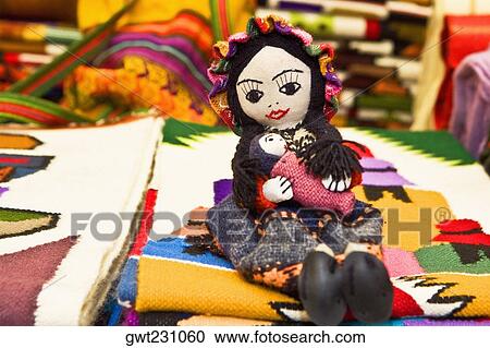 Doll and carpets in a market stall, Pisaq, Cuzco, Peru View Large Photo Image Stock Image - Doll and carpets in a market stall, Pisaq, Cuzco, Peru. Fotosearch