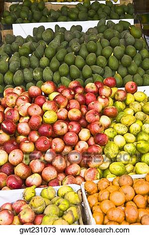 High angle view of assorted fruits at a market stall, Ica, Ica Region, Peru View Large Photo Image Stock Image - High angle view of assorted fruits at a market stall, Ica, Ica Region, Peru. Fotosearch