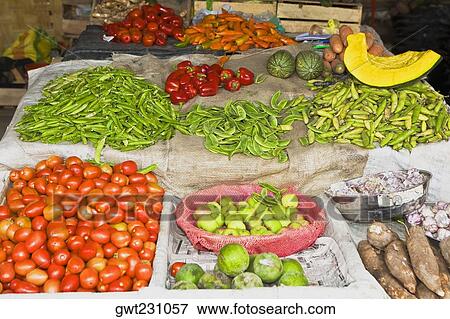 Stock Photo - High angle view of assorted vegetables at a market stall, Ica, Ica Region, Peru. Fotosearch