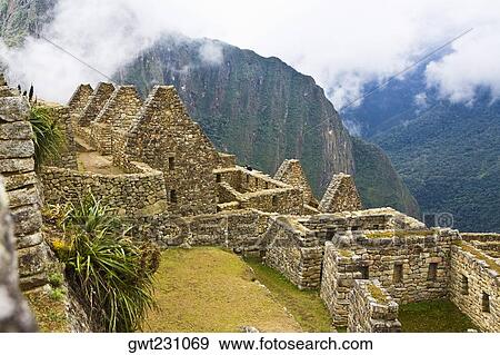 High angle view of ruins on mountains, Machu Picchu, Cusco Region, Peru View Large Photo Image Stock Photo - High angle view of ruins on mountains, Machu Picchu, Cusco Region, Peru. Fotosearch