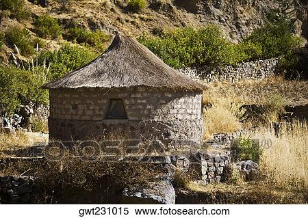 Thatched roof hut on a mountain, Chivay, Arequipa, Peru View Large Photo Image Stock Photography - Thatched roof hut on a mountain, Chivay, Arequipa, Peru. Fotosearch