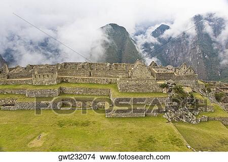 High angle view of ruins on mountains, Machu Picchu, Cusco Region, Peru View Large Photo Image Picture - High angle view of ruins on mountains, Machu Picchu, Cusco Region, Peru. Fotosearch