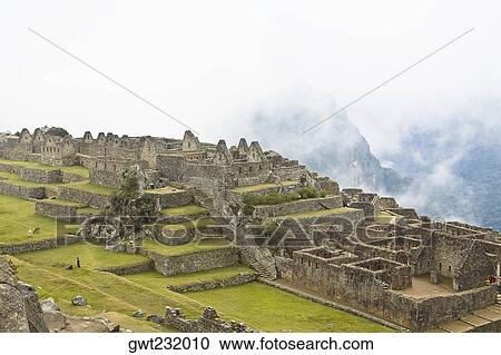 High angle view of ruins on mountains, Machu Picchu, Cusco Region, Peru View Large Photo Image Stock Image - High angle view of ruins on mountains, Machu Picchu, Cusco Region, Peru. Fotosearch