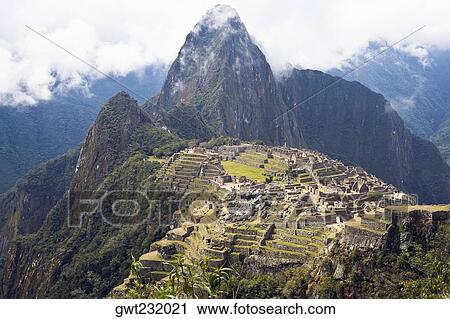 High angle view of ruins on mountains, Machu Picchu, Cusco Region, Peru View Large Photo Image Stock Image - High angle view of ruins on mountains, Machu Picchu, Cusco Region, Peru. Fotosearch