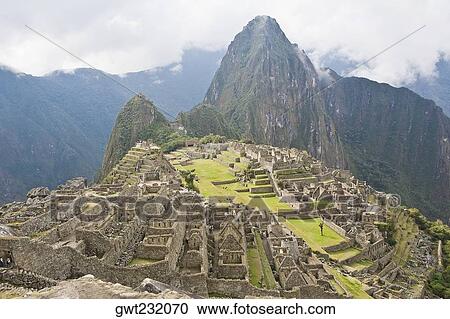 High angle view of ruins on mountains, Machu Picchu, Cusco Region, Peru View Large Photo Image Stock Image - High angle view of ruins on mountains, Machu Picchu, Cusco Region, Peru. Fotosearch