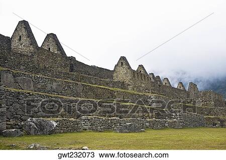 Low angle view of ruins on mountains, Machu Picchu, Cusco Region, Peru View Large Photo Image Stock Image - Low angle view of ruins on mountains, Machu Picchu, Cusco Region, Peru. Fotosearch