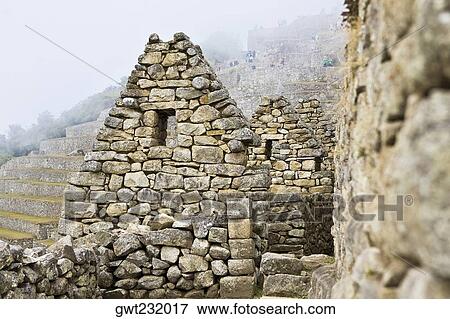 Old ruins of stone structures, Machu Picchu, Cusco Region, Peru View Large Photo Image Stock Photo - Old ruins of stone structures, Machu Picchu, Cusco Region, Peru. Fotosearch