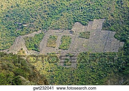Stock Image - Panoramic view the of old ruins, Andenes, Choquequirao, Inca, Cusco Region, Peru. Fotosearch
