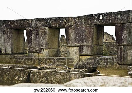 Stock Image - Stone wall of a temple, Temple of The Sun, Machu Picchu, Urubamba Valley, Cuzco, Peru. Fotosearch